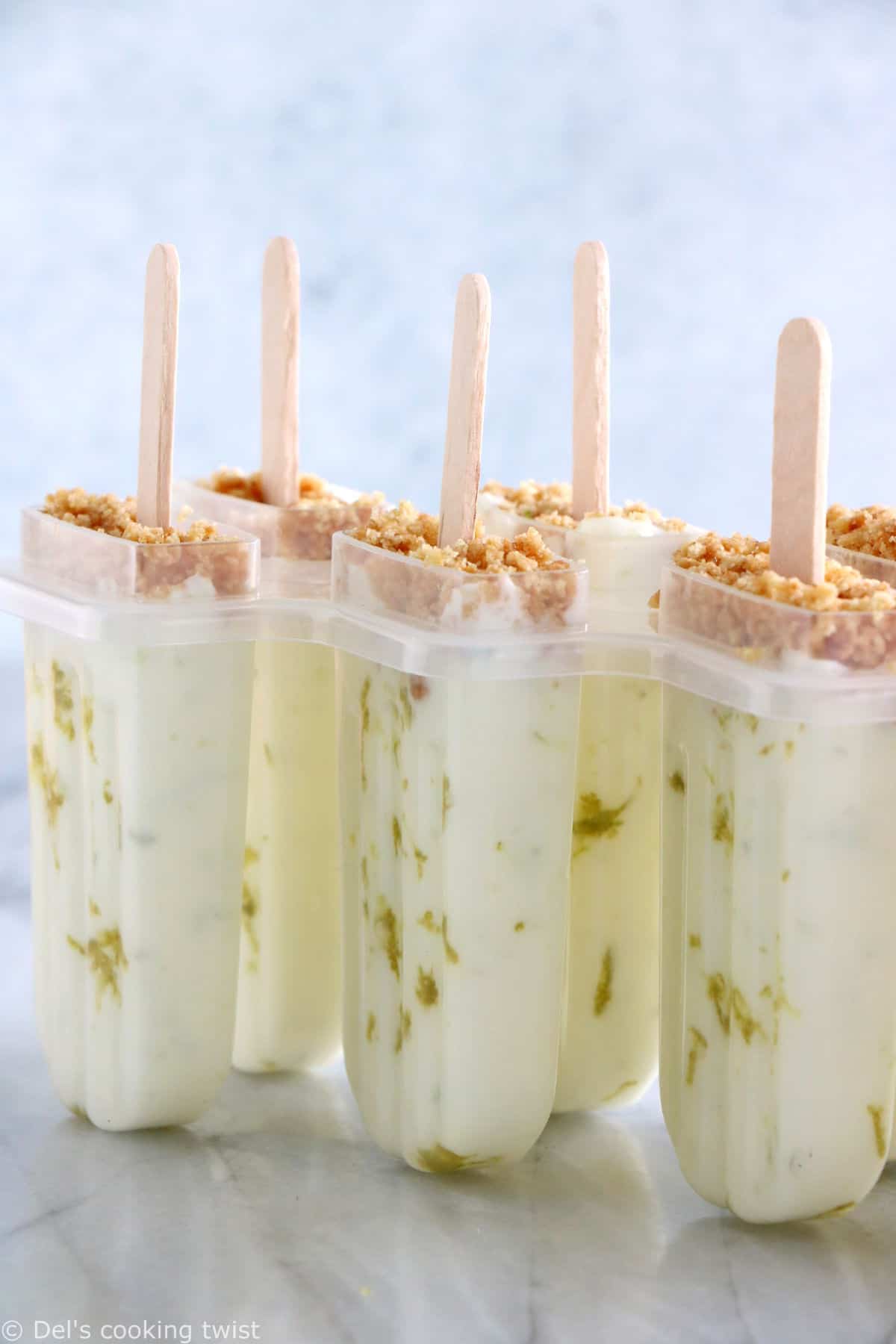 These key lime pie popsicles make the best refreshing summer treat. Quick and super easy to make with 3 main ingredients, they are lightly sweetened and also available in a gluten-free version.