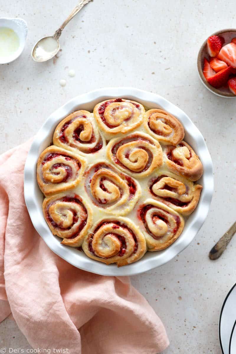 Perfect for weekend breakfast, these sweet strawberry rolls topped with a subtle lemon glaze are soft, pillowy, and beaming with strawberry flavor.