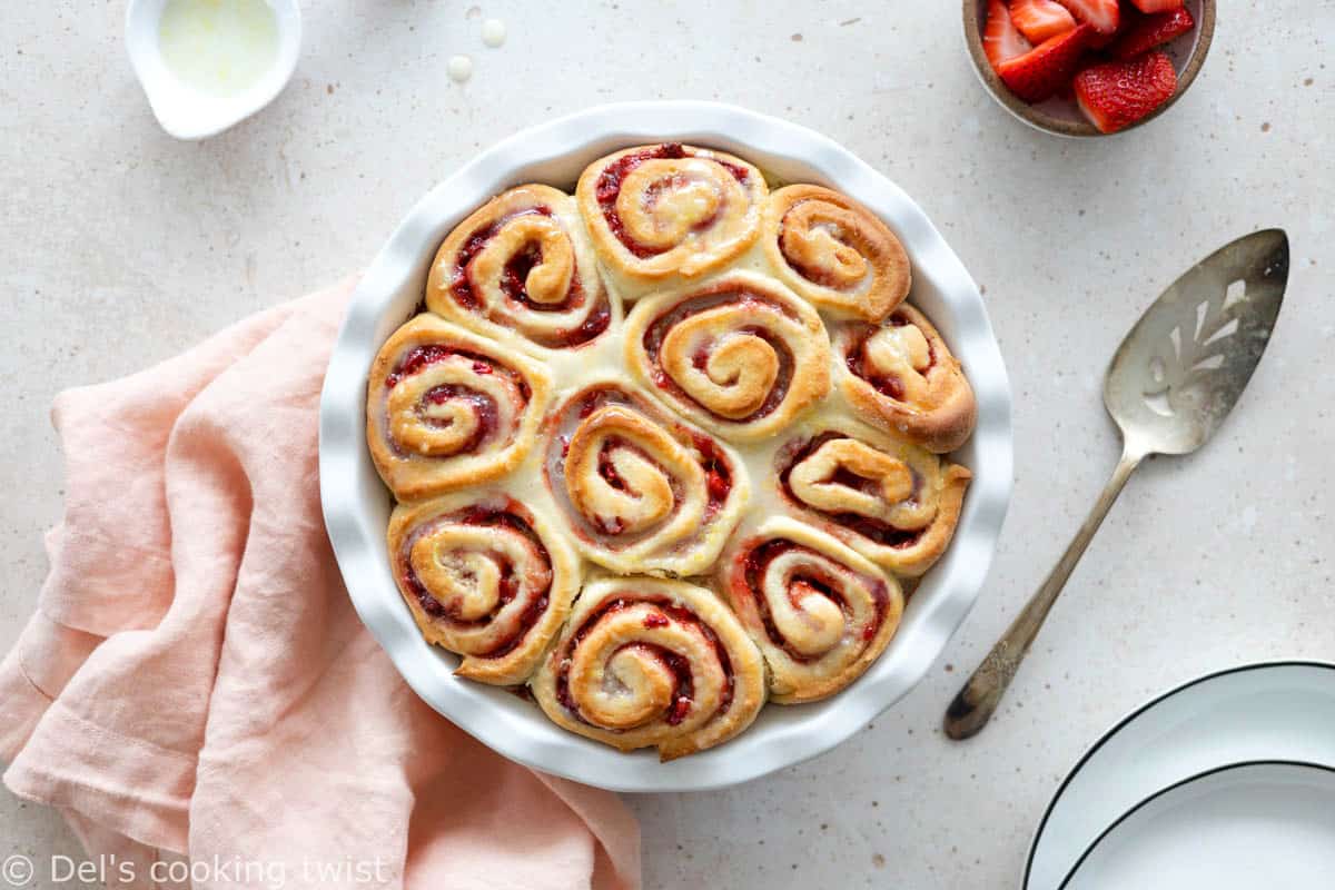 Perfect for weekend breakfast, these sweet strawberry rolls topped with a subtle lemon glaze are soft, pillowy, and beaming with strawberry flavor.