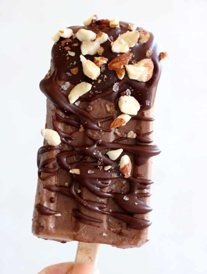 Chocolate almond butter banana popsicles make a decadent summer treat. Both rich and fudgy, they're entirely vegan and prepared with nutritious, natural ingredients. The perfect healthy snack on a stick.