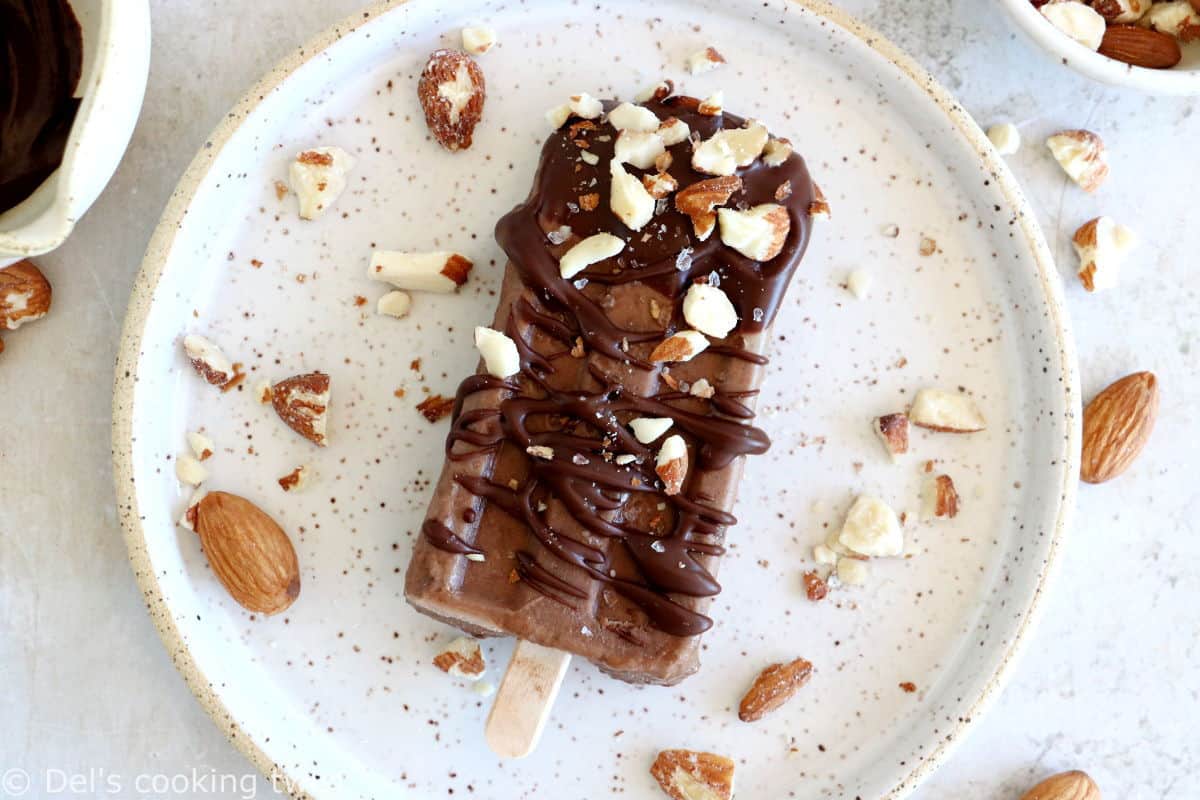 Chocolate almond butter banana popsicles make a decadent summer treat. Both rich and fudgy, they're entirely vegan and prepared with nutritious, natural ingredients. The perfect healthy snack on a stick.