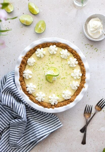 With its sweet and tart flavors, this key lime pie will tickle your taste buds! Easy to make, with just a handful of ingredients, this refreshing summer dessert features a simple graham cracker crust topped with a smooth and creamy key lime filling.