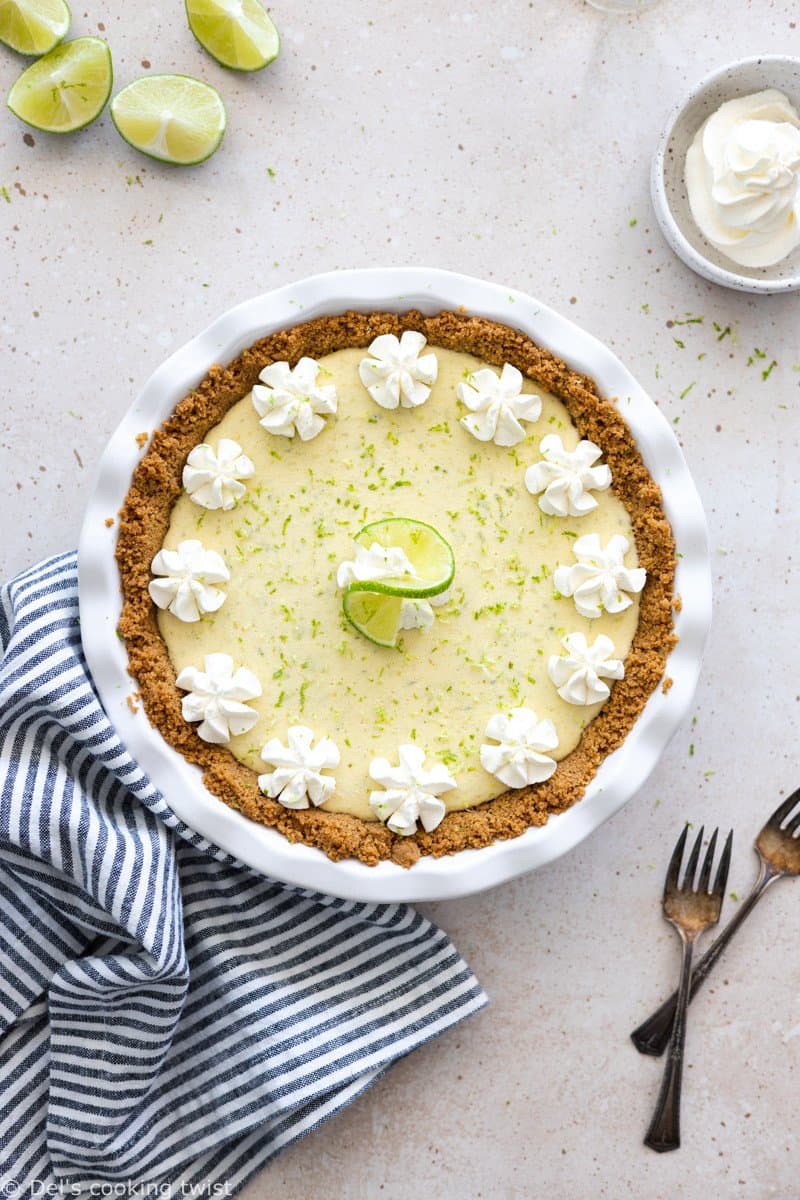 With its sweet and tart flavors, this key lime pie will tickle your taste buds! Easy to make, with just a handful of ingredients, this refreshing summer dessert features a simple graham cracker crust topped with a smooth and creamy key lime filling.
