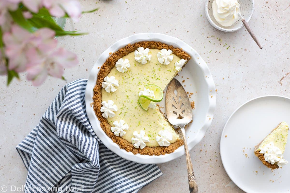 With its sweet and tart flavors, this key lime pie will tickle your taste buds! Easy to make, with just a handful of ingredients, this refreshing summer dessert features a simple graham cracker crust topped with a smooth and creamy key lime filling.