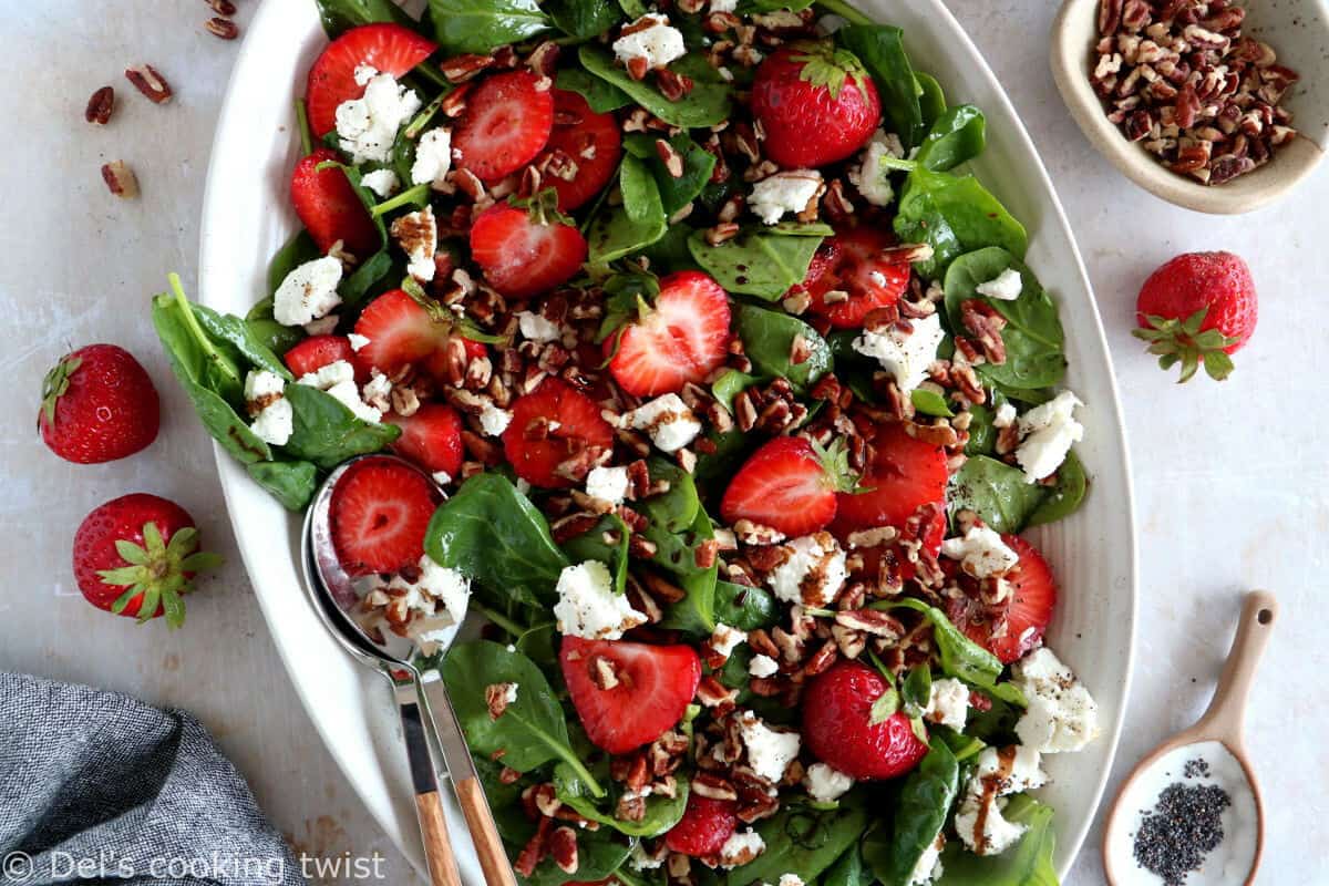 This strawberry spinach salad with goat cheese is tossed in a flavorful balsamic poppy seed dressing. A simple summer salad recipe!