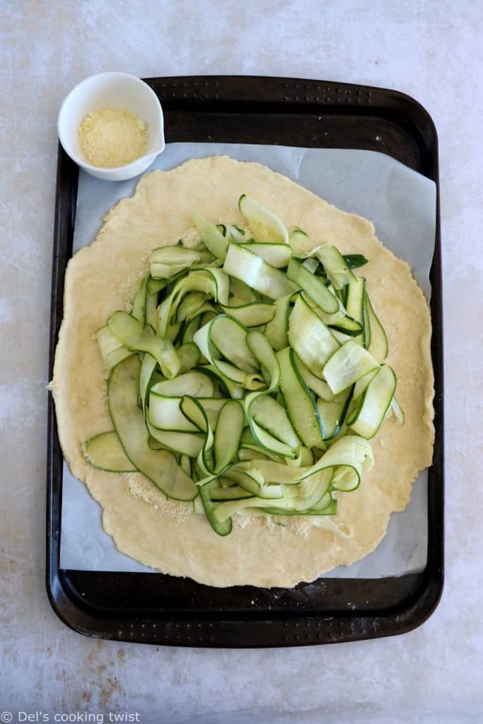 This beautiful zucchini galette is prepared with honey zucchini ribbons, toasted hazelnuts, and some burrata cheese bursting with refreshing flavors.