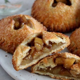 Apple hand pies are like apple pie in individual portions. They feature a sweet apple cinnamon filling inside an irresistible flaky crust.