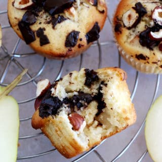 Hazelnut pear and chocolate chip muffins make a fantastic fall treat for an afternoon tea. They are loaded with dark chocolate chunks, juicy pears, and hazelnuts for an irresistible crunchy bite.