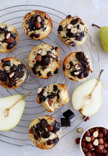 Hazelnut pear and chocolate chip muffins make a fantastic fall treat for an afternoon tea. They are loaded with dark chocolate chunks, juicy pears, and hazelnuts for an irresistible crunchy bite.