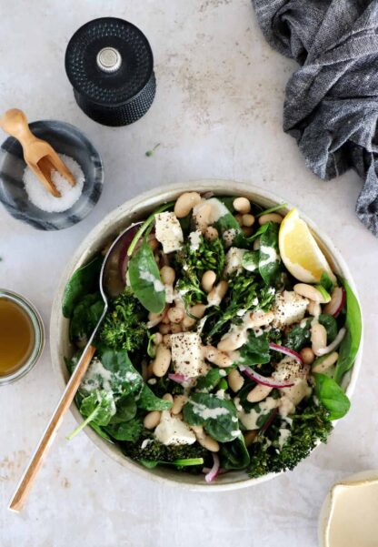 This vibrant roasted broccoli and white bean salad with feta is a simple healthy salad recipe filled with refreshing flavors.