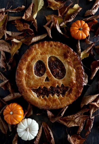 This frightful Jack-O'-Lantern vegetarian pot pie is a comforting main course that will make a great centerpiece at your Halloween dinner table. 