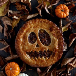 This frightful Jack-O'-Lantern vegetarian pot pie is a comforting main course that will make a great centerpiece at your Halloween dinner table. 