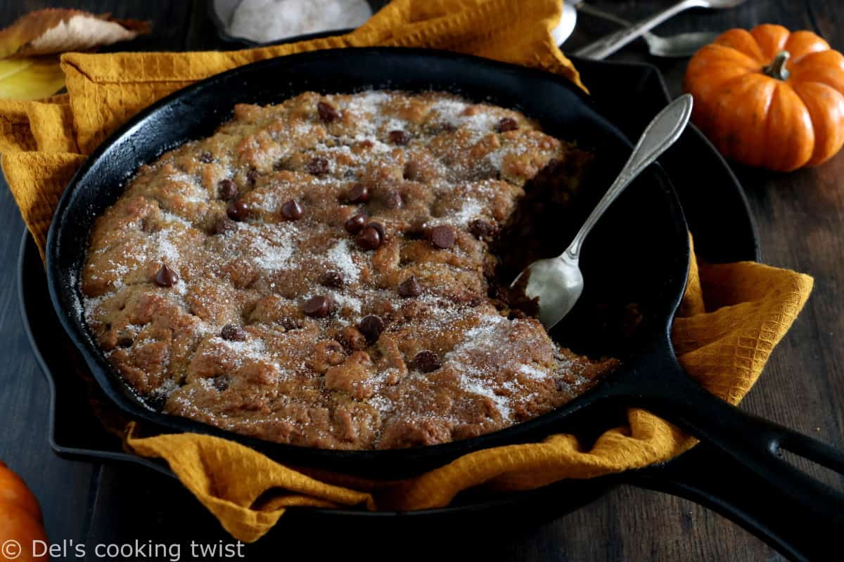 This pumpkin skillet cookie is rich, incredibly fudgy, loaded with chocolate chips and pumpkin spice flavors.