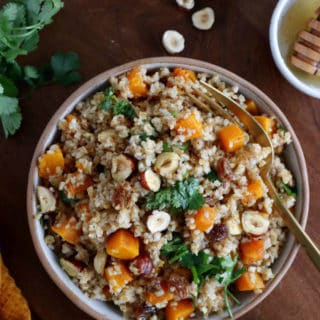 Butternut squash tabbouleh is prepared with bulgur, raisins, crunchy hazelnuts and fresh cilantro, generously coated in a honey vinaigrette.