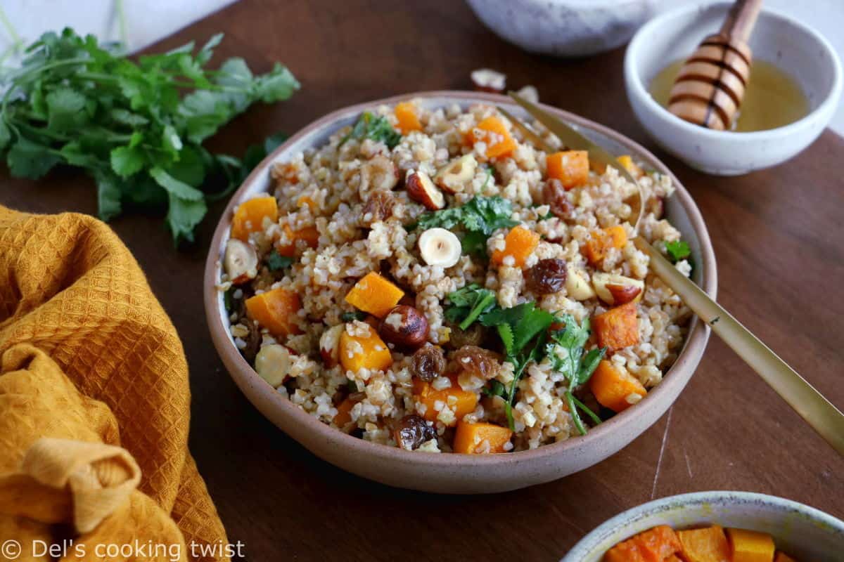 Butternut squash tabbouleh is prepared with bulgur, raisins, crunchy hazelnuts and fresh cilantro, generously coated in a honey vinaigrette.