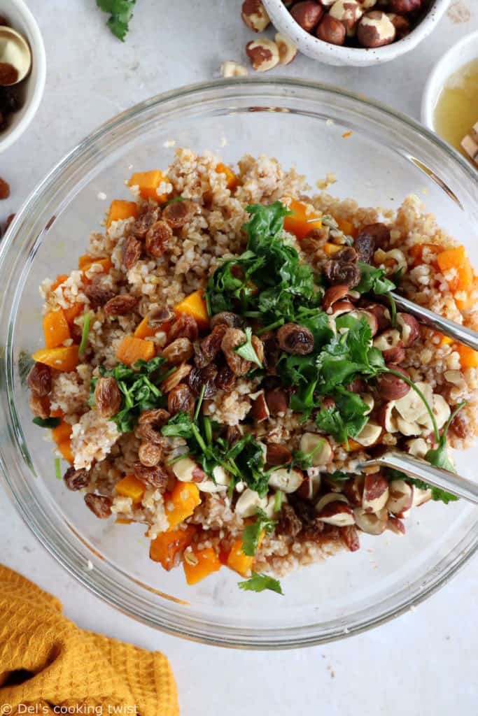 Butternut squash tabbouleh is prepared with bulgur, raisins, crunchy hazelnuts and fresh cilantro, generously coated in a honey vinaigrette.