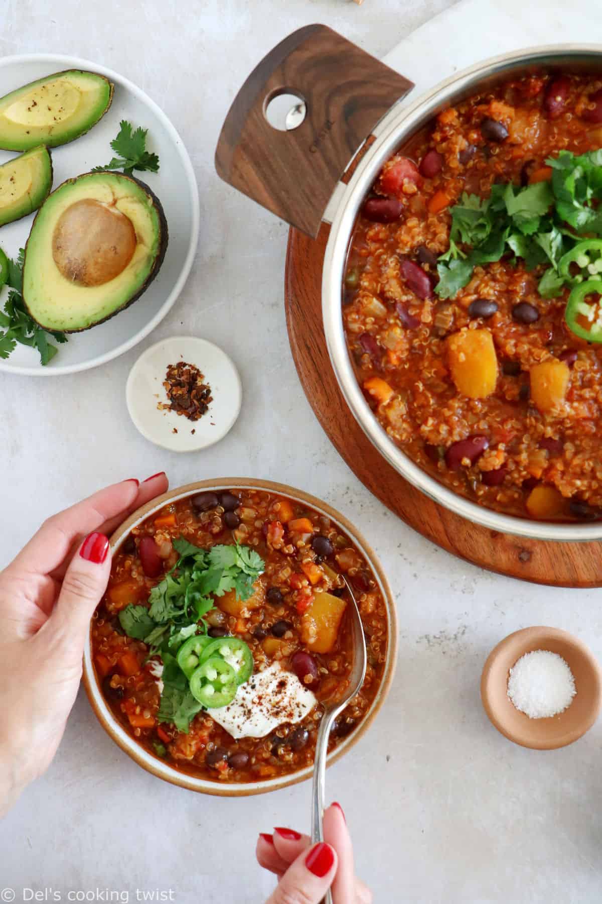 This vegetarian butternut squash quinoa chili is hearty, healthy and very satisfying. It features chunks of butternut squash, black beans, and quinoa for some additional texture.