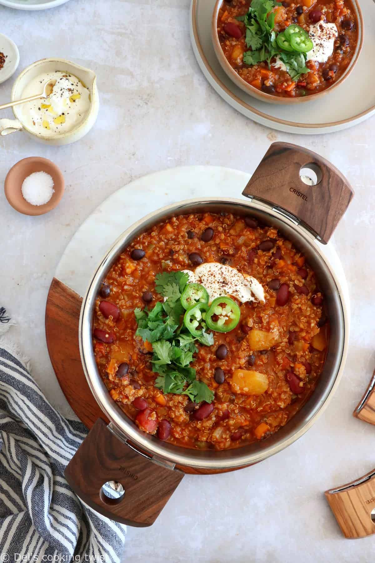 This vegetarian butternut squash quinoa chili is hearty, healthy and very satisfying. It features chunks of butternut squash, black beans, and quinoa for some additional texture.