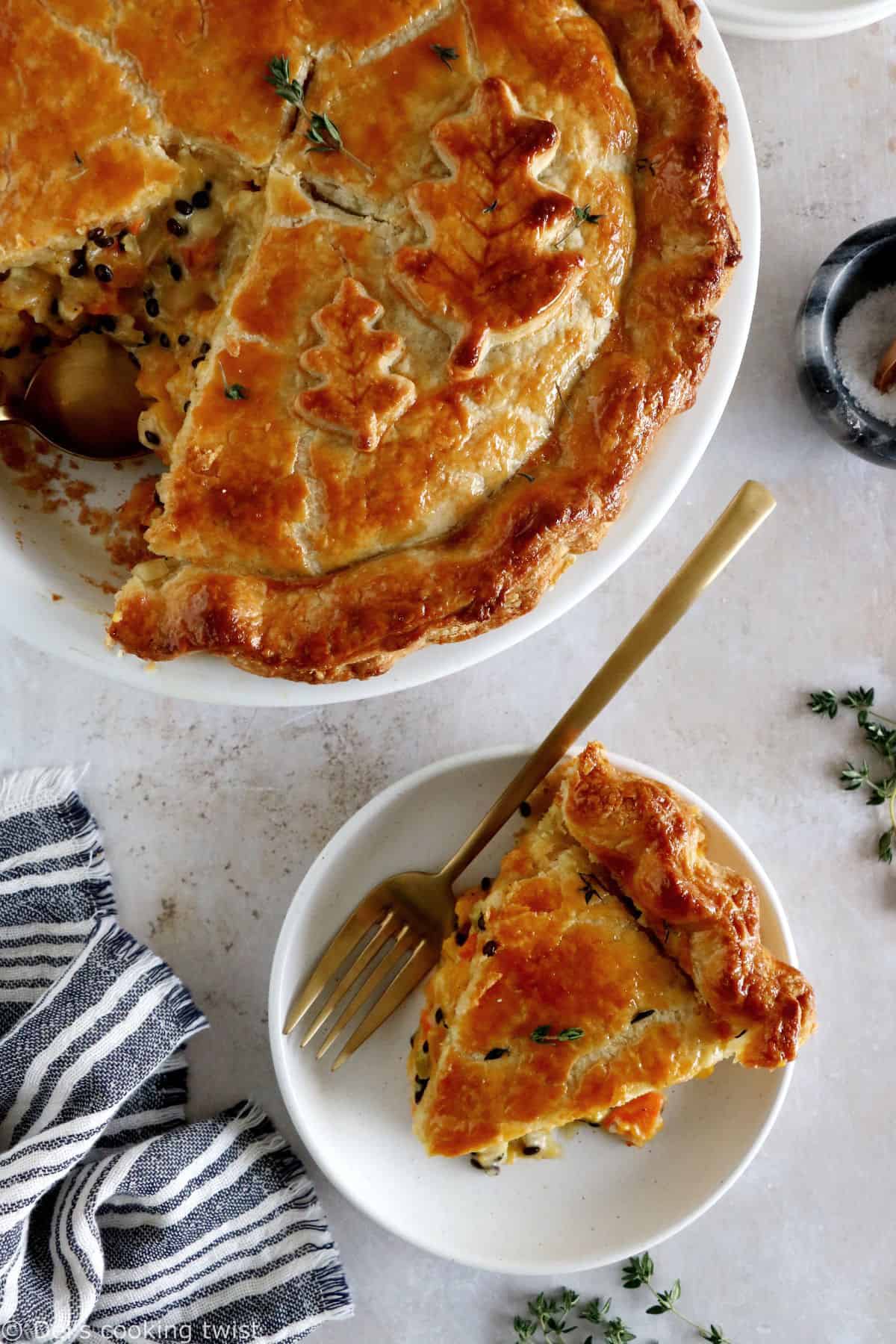 This butternut squash and lentil pot pie is prepared with a hearty and creamy vegetable filling, tucked into two homemade pie crusts.