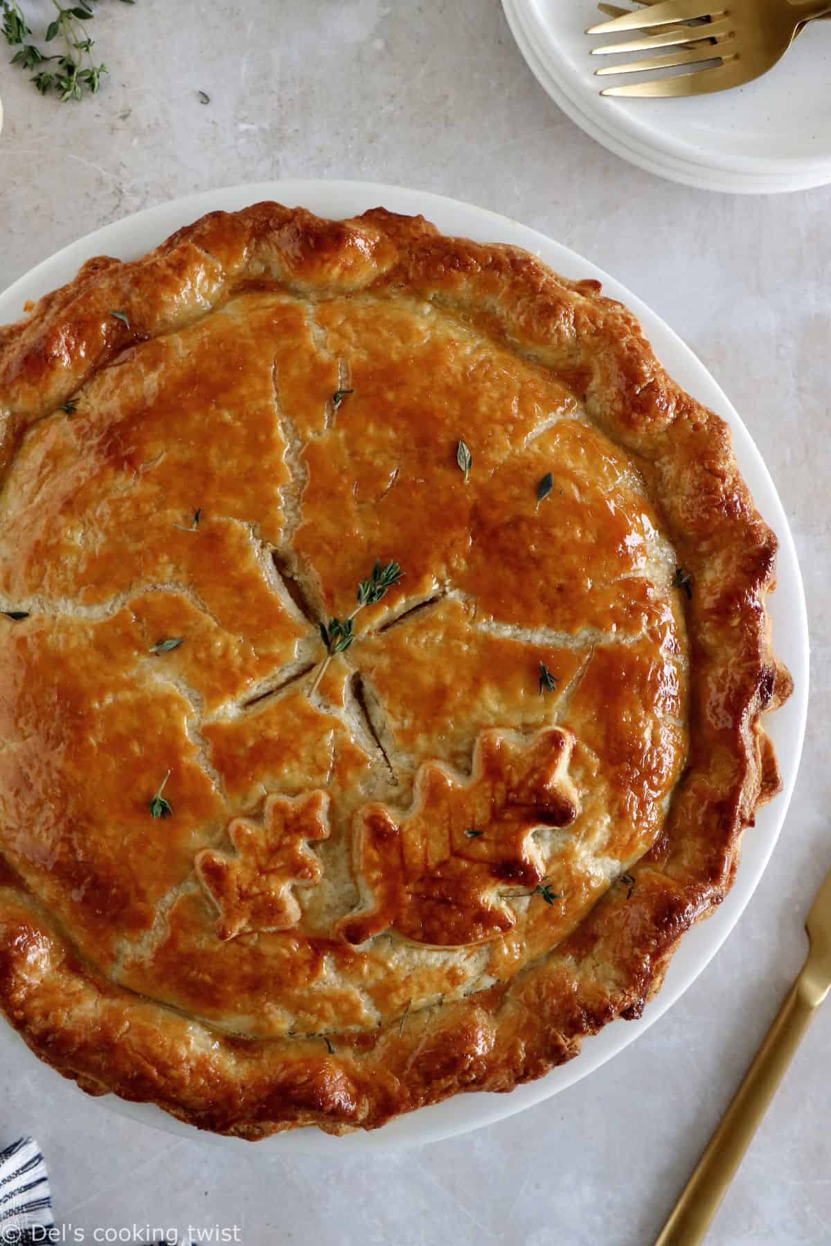 This butternut squash and lentil pot pie is prepared with a hearty and creamy vegetable filling, tucked into two homemade pie crusts.