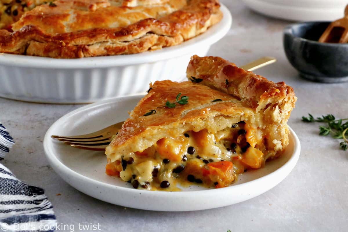 This butternut squash and lentil pot pie is prepared with a hearty and creamy vegetable filling, tucked into two homemade pie crusts.