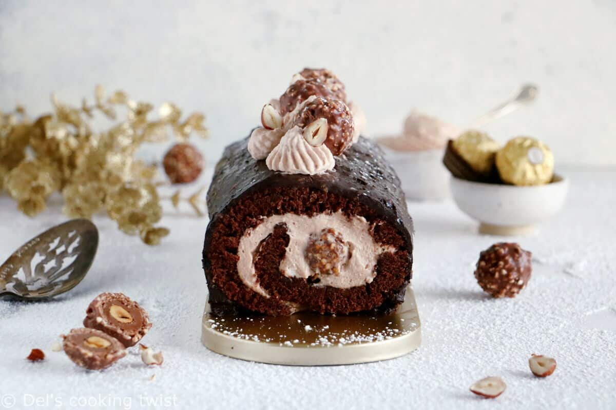 Ferrero Rocher Cake Roll consists in a chocolate sponge cake, a creamy chocolate-hazelnut mascarpone filling hiding some whole Ferrero Rochers, and a crispy Rocher chocolate coating on top.