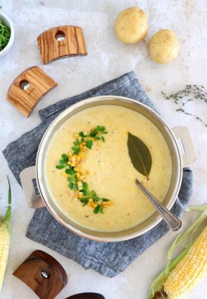 Vegetarian corn chowder is a rich, creamy, and hearty soup, prepared with fresh sweet corn and potatoes.