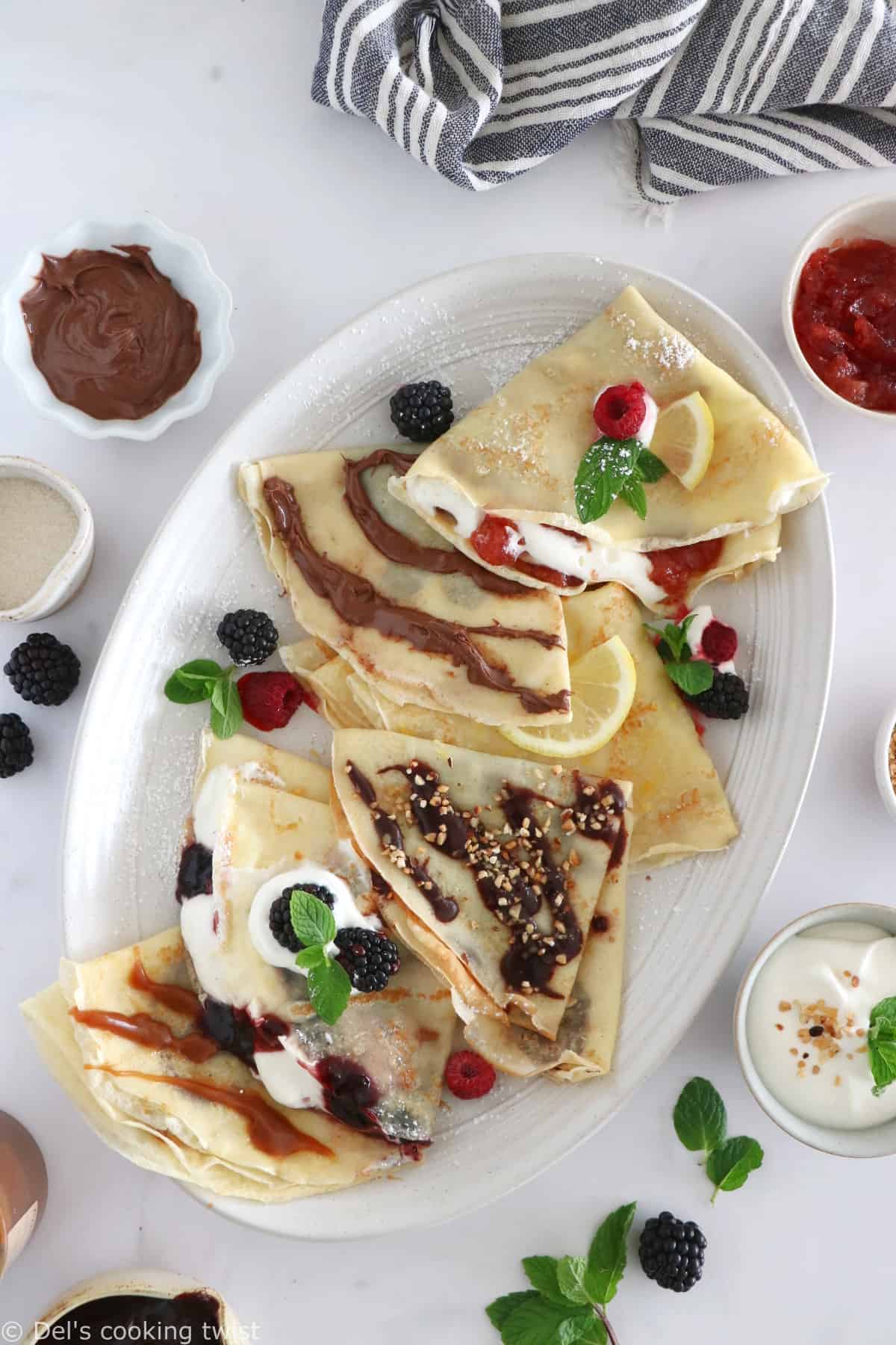 Discover my favorite crepe filling ideas for a perfect and delicious dessert crepe party! Jam, chocolate spread, lemon and sugar, you'll sure find your favorite too!