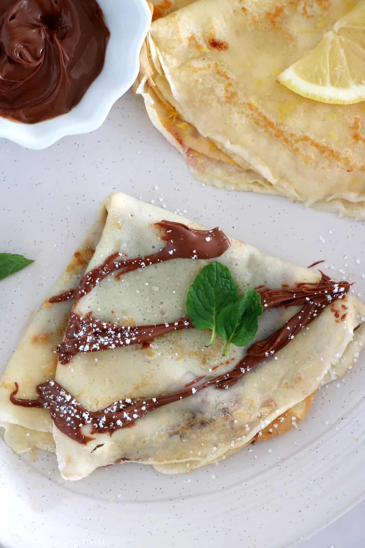 Discover my favorite crepe filling ideas for a perfect and delicious dessert crepe party! Jam, chocolate spread, lemon and sugar, you'll sure find your favorite too!