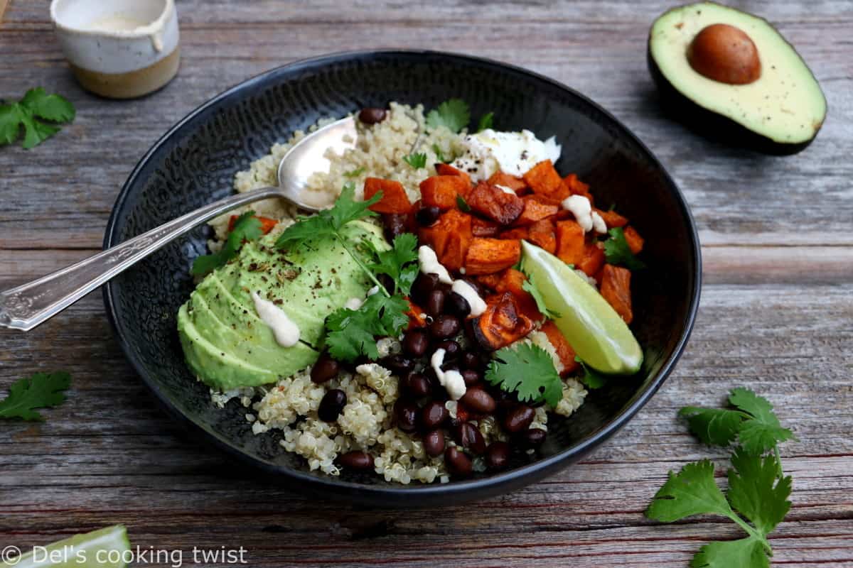 Sweet potato black bean quinoa bowl with tahini dressing makes a nourishing, healthy vegan meal loaded with veggies and plant-based protein.