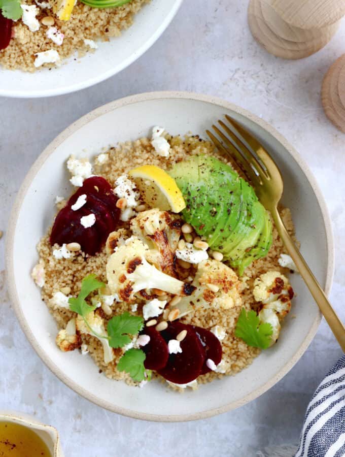 Avocado, beet and roasted cauliflower bowl with goat cheese is a simple healthy and nourishing meal, halfway between a salad and a warm bowl.