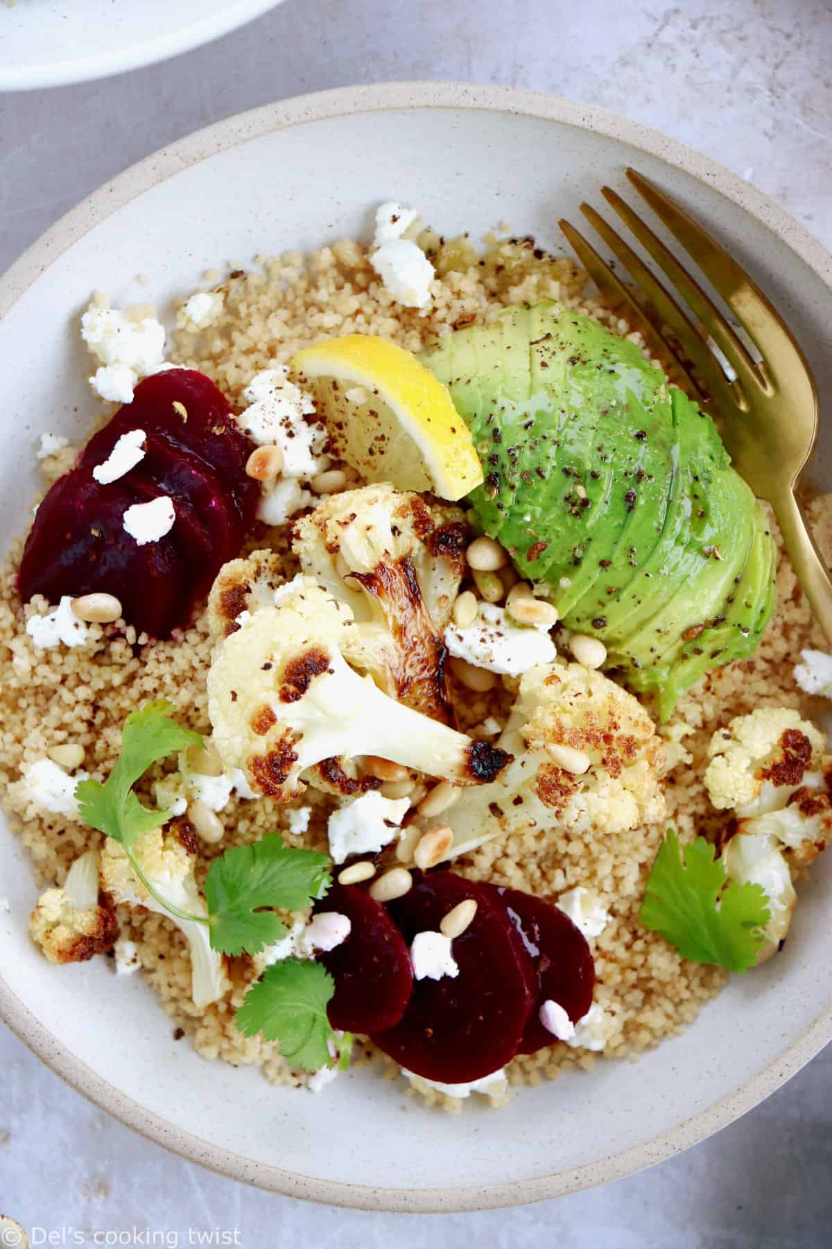 Avocado, beet and roasted cauliflower bowl with goat cheese is a simple healthy and nourishing meal, halfway between a salad and a warm bowl.