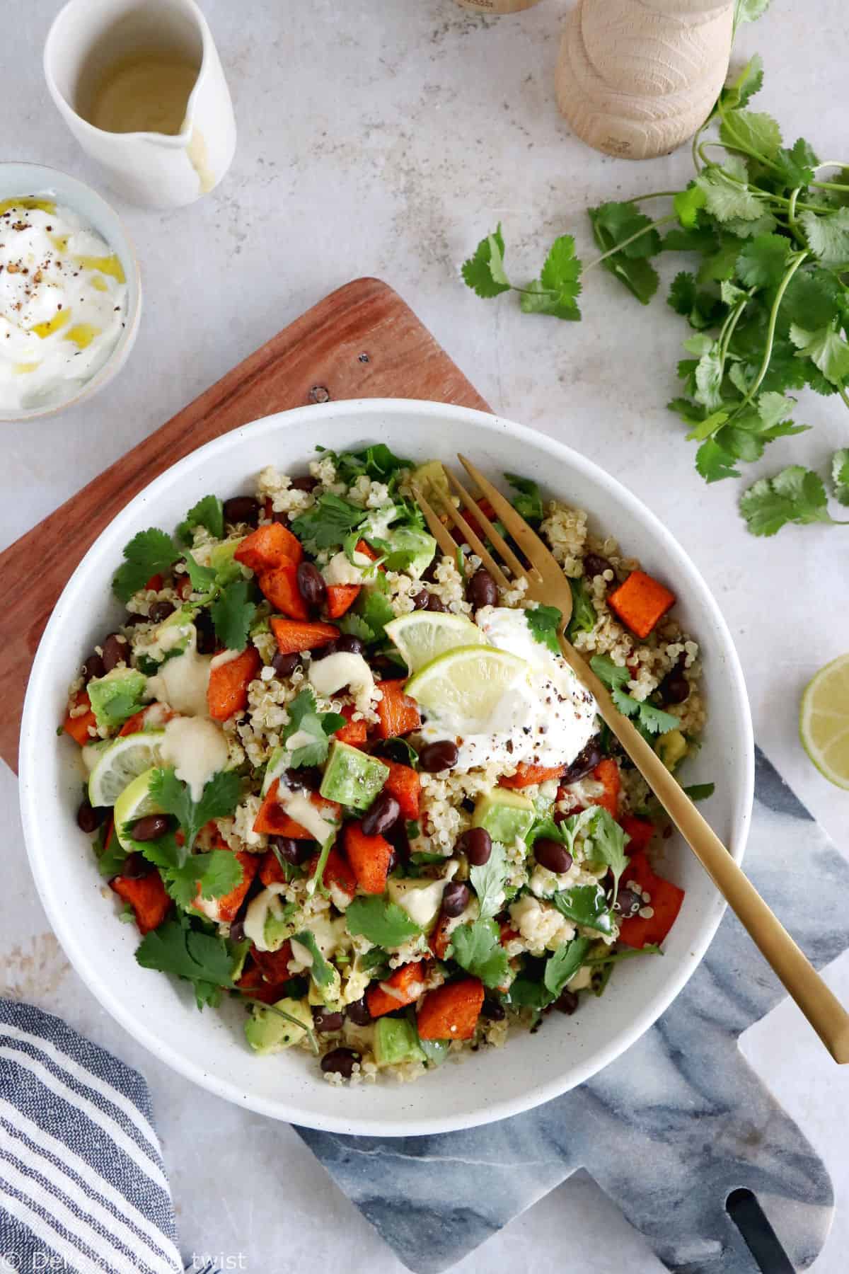 Make the best of winter veggies with this cajun-spiced butternut squash quinoa bowl, served with a cashew dressing. A nourishing bowl that is naturally vegan and gluten-free.