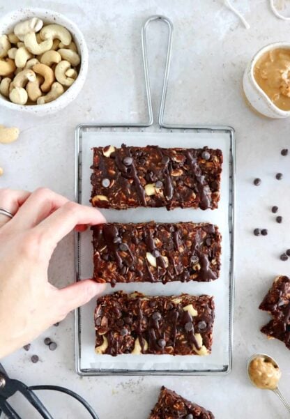 Soft chocolate granola bars are the perfect chocolaty healthy snack! Quick and easy to make with just a handful of ingredients, these granola bars are super soft, chewy, and freeze extremely well.