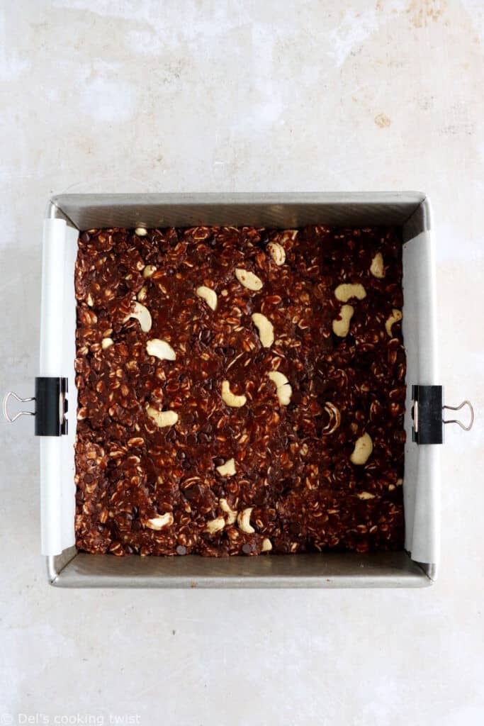 Soft chocolate granola bars are the perfect chocolaty healthy snack! Quick and easy to make with just a handful of ingredients, these granola bars are super soft, chewy, and freeze extremely well.