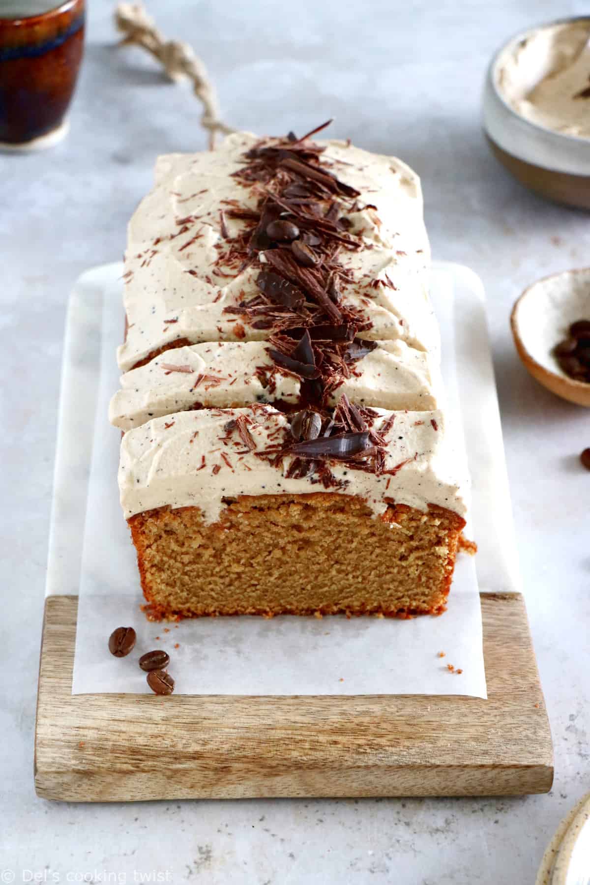 Rich in coffee flavors, this rich and moist coffee loaf cake with espresso frosting will be perfect for an afternoon tea or to serve as a dessert with a cup of coffee. 