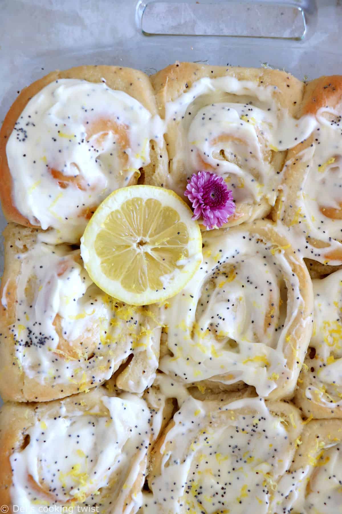 Lemon poppy seed sweet rolls are incredibly soft and fluffy, loaded with lemony flavors, and topped with an ooey-gooey cream cheese frosting.