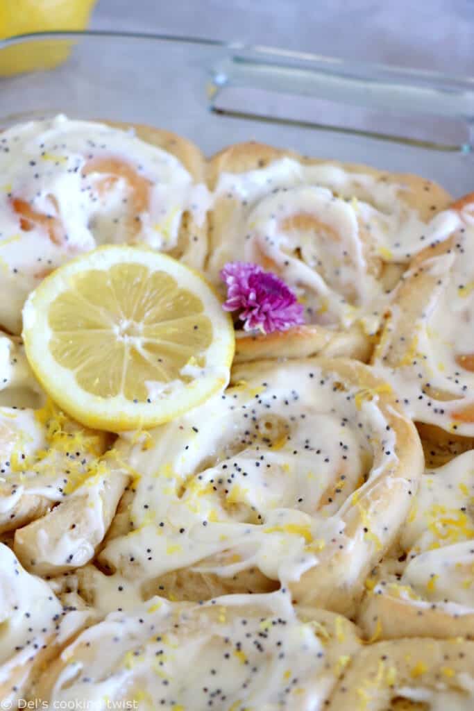 Lemon poppy seed sweet rolls are incredibly soft and fluffy, loaded with lemony flavors, and topped with an ooey-gooey cream cheese frosting.