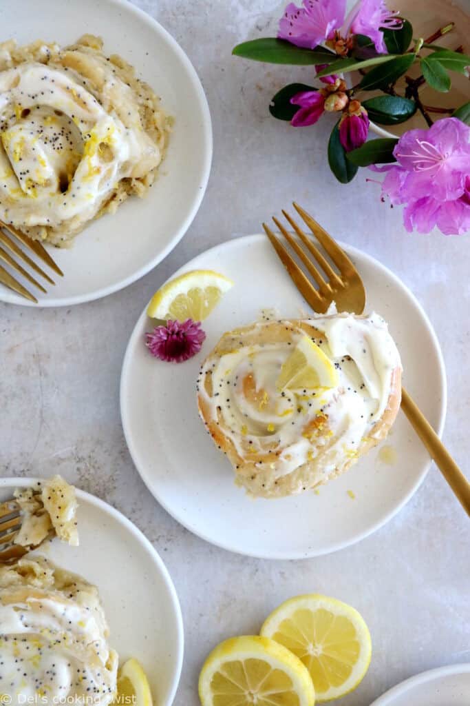 Lemon poppy seed sweet rolls are incredibly soft and fluffy, loaded with lemony flavors, and topped with an ooey-gooey cream cheese frosting.