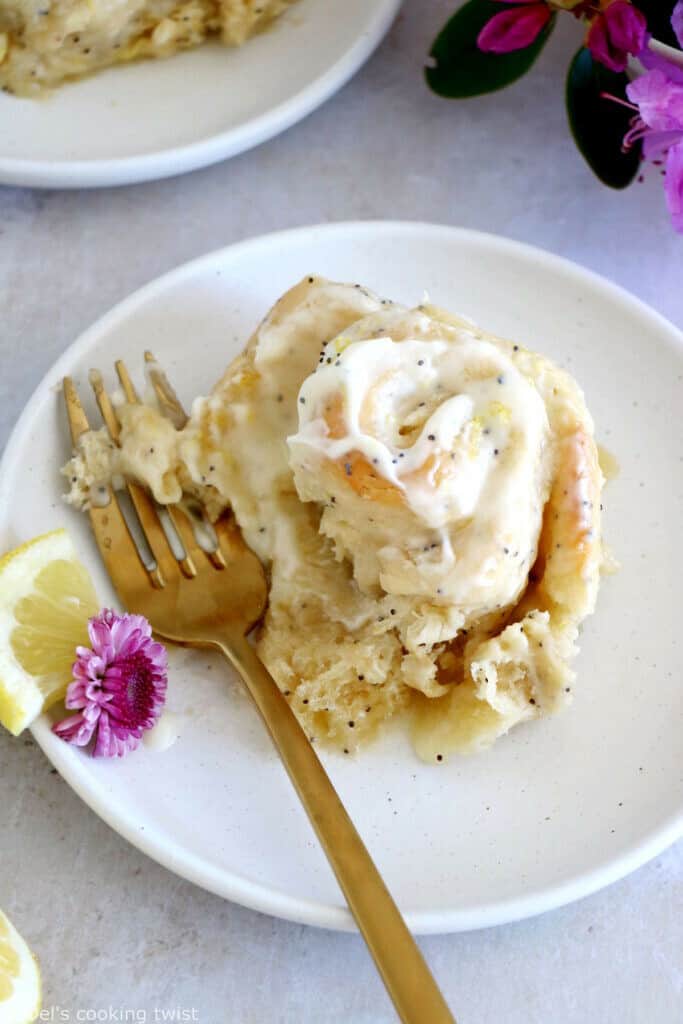 Lemon poppy seed sweet rolls are incredibly soft and fluffy, loaded with lemony flavors, and topped with an ooey-gooey cream cheese frosting.