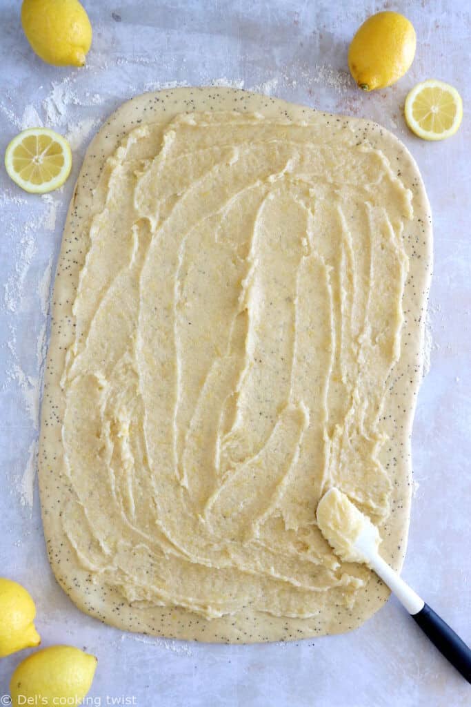 Lemon poppy seed sweet rolls are incredibly soft and fluffy, loaded with lemony flavors, and topped with an ooey-gooey cream cheese frosting.