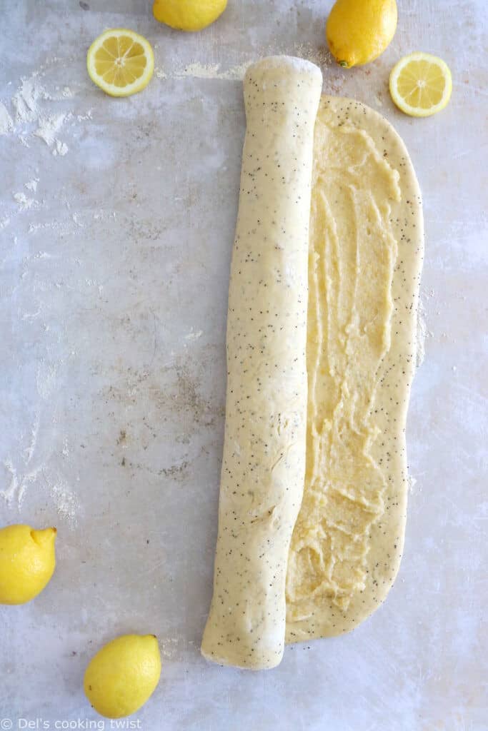 Lemon poppy seed sweet rolls are incredibly soft and fluffy, loaded with lemony flavors, and topped with an ooey-gooey cream cheese frosting.