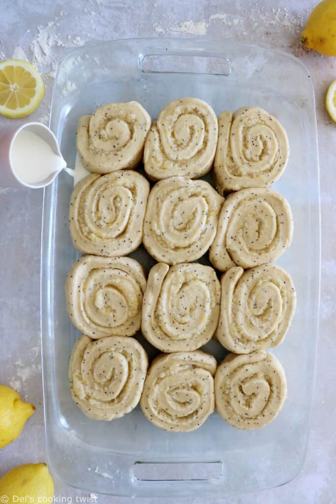 Lemon poppy seed sweet rolls are incredibly soft and fluffy, loaded with lemony flavors, and topped with an ooey-gooey cream cheese frosting.