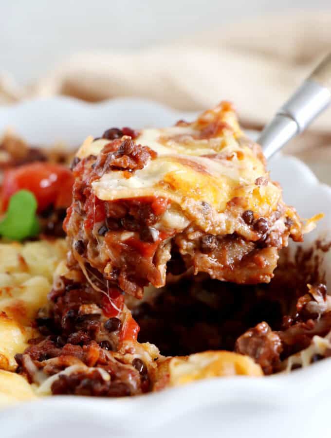 Vegetarian bolognese lasagna feature layers of slow-cooked lentil ragù, pasta sheets and creamy bechamel sauce, all baked to a golden-brown perfection.