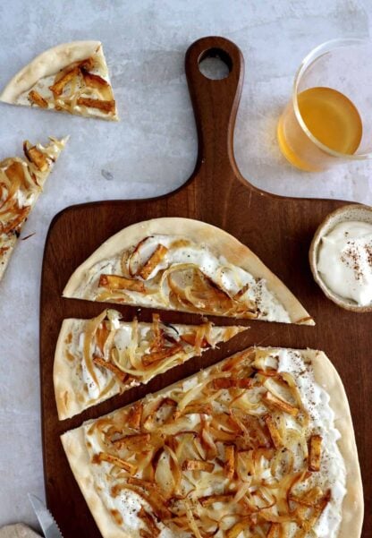 Vegetarian flammekueche is a spin on the traditional dish originated from Alsace, here prepared with smoked tofu.