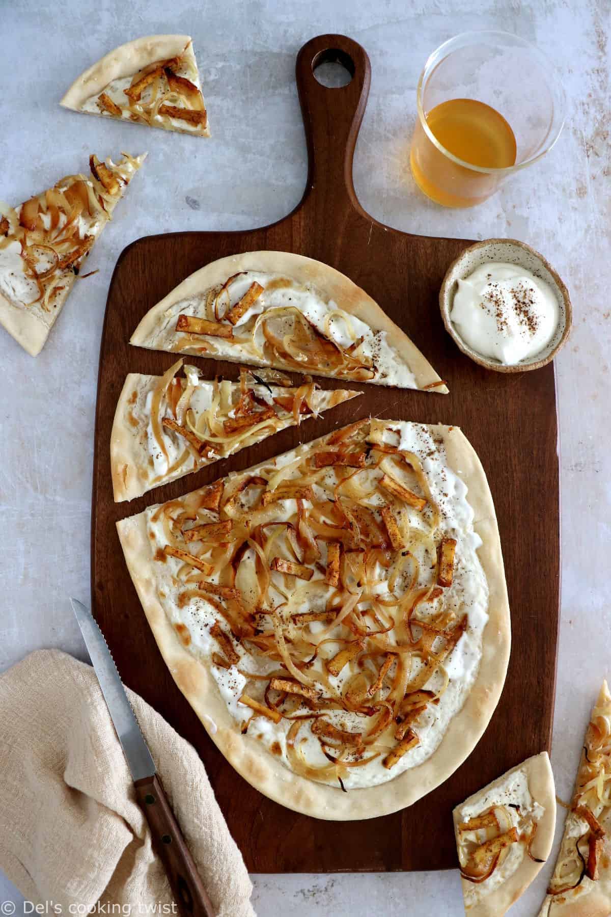 Vegetarian flammekueche is a spin on the traditional dish originated from Alsace, here prepared with smoked tofu.