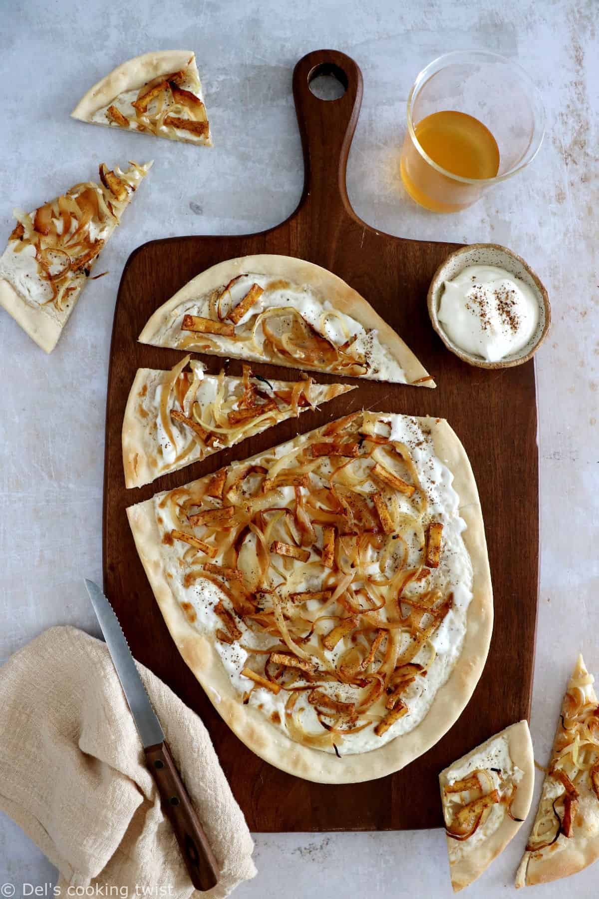 Vegetarian flammekueche is a spin on the traditional dish originated from Alsace, here prepared with smoked tofu.