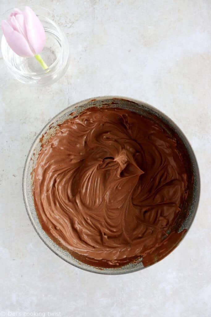 Chocolate hazelnut Easter egg cake will sure steal the show at any Easter party. It's prepared with a soft and moist hazelnut cake, topped with a chocolate ganache and a white chocolate ganache.