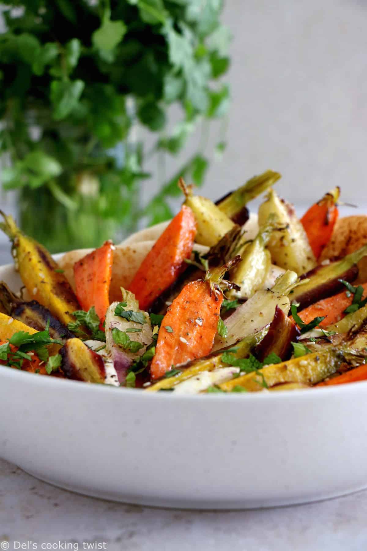 Za'atar roasted carrots with whipped feta is a ridiculously simple recipe combining roasted veggies and a creamy cheese dip.