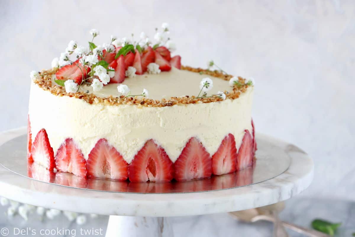 Fraisier cake is a traditional French strawberry cake, consisting of two layers of genoise sponge, filled with a silky delicious vanilla mousseline cream and fresh strawberries.